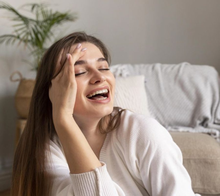 a women is smiling using advanced dental technologies